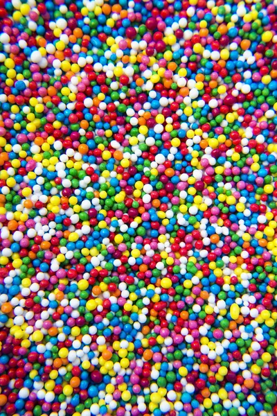 Mix of colorful Sugar balls powder background — Stock Photo, Image