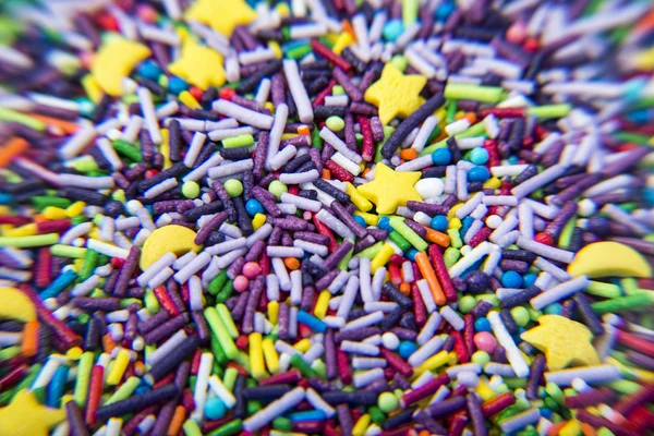 Blandning av färgglada socker pulver bakgrund — Stockfoto