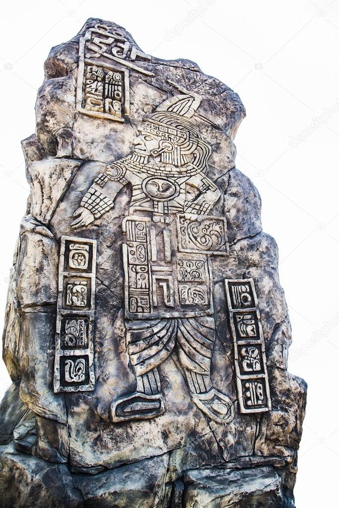 Ancient Mayan hieroglyphics in stone