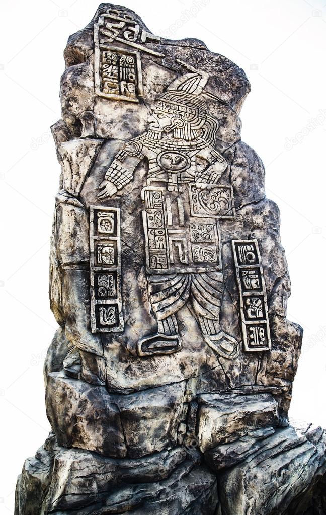 Ancient Mayan hieroglyphics in stone