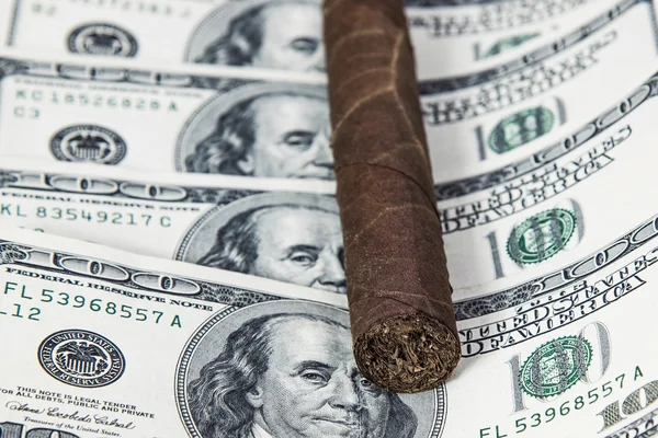 Cuban cigar on the hundred Dollars