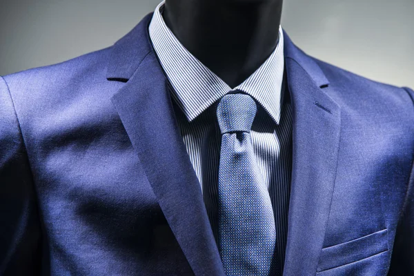 Tie on elegant blue suit. — Stock Photo, Image