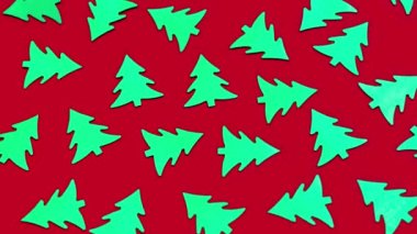 Kırmızı arka planda bir sürü yeşil Noel ağacı yanıp sönüyor. Parlak dekoratif desenler. Ağaçların düşüşü. Hareket animasyonunu durdur. Parlak yeni yıl konsepti. Xmas sembolü. Çevre. 