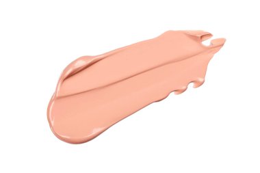 Beyaz arka planda hassas bej tonal fondöten lekesi. Pembe ton lekesi. Güzel pastel krem..