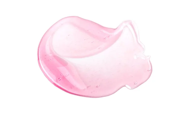 Hermosa mancha rosa transparente de ácido hialurónico sobre fondo blanco. Gel antibacteriano. El suero facial está manchado.. — Foto de Stock