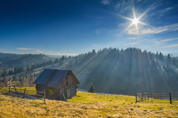 Wooden rustic house on a mountain hill — Stock Photo, Image