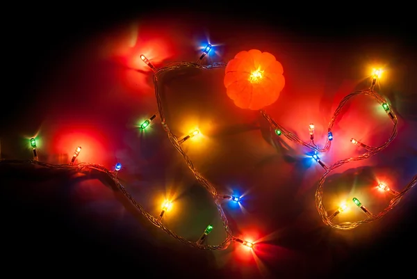 Mandarina e luz de Natal — Fotografia de Stock