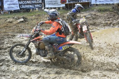 SIBIU, ROMANIA - JULY 16: A competitor in Red Bull ROMANIACS Hard Enduro Rally with a KTM motorcycle. The hardest enduro rally in the world. July 12-16, 2016 in Sibiu, Romania.