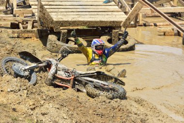 SIBIU, ROMANIA - JULY 16: A competitor in Red Bull ROMANIACS Hard Enduro Rally with a KTM motorcycle. The hardest enduro rally in the world. July 12-16, 2016 in Sibiu, Romania.