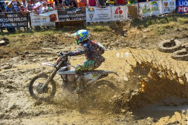 SIBIU, ROMANIA - JULY 16: A competitor in Red Bull ROMANIACS Hard Enduro Rally with a KTM motorcycle. The hardest enduro rally in the world. July 12-16, 2016 in Sibiu, Romania.