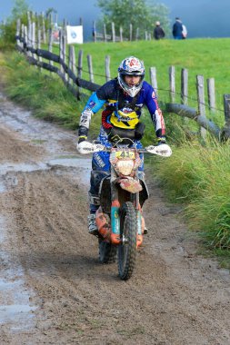 SIBIU, ROMANIA - JULY 16: A competitor in Red Bull ROMANIACS Hard Enduro Rally with a KTM motorcycle. The hardest enduro rally in the world. July 12-16, 2016 in Sibiu, Romania.
