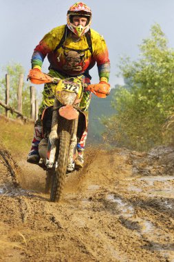 SIBIU, ROMANIA - JULY 16: A competitor in Red Bull ROMANIACS Hard Enduro Rally with a KTM motorcycle. The hardest enduro rally in the world. July 12-16, 2016 in Sibiu, Romania.