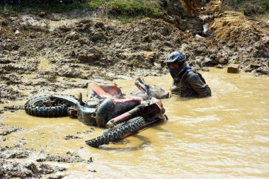 SIBIU, ROMANIA - JULY 16: A competitor in Red Bull ROMANIACS Hard Enduro Rally with a KTM motorcycle. The hardest enduro rally in the world. July 12-16, 2016 in Sibiu, Romania.
