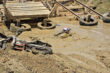 SIBIU, ROMANIA - JULY 16: A competitor in Red Bull ROMANIACS Hard Enduro Rally with a KTM motorcycle. The hardest enduro rally in the world. July 12-16, 2016 in Sibiu, Romania.