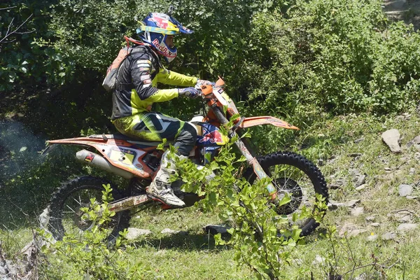 SIBIU, ROMANIA - JULY 16: A competitor in Red Bull ROMANIACS Hard Enduro Rally with a KTM motorcycle. The hardest enduro rally in the world. July 12-16, 2016 in Sibiu, Romania.
