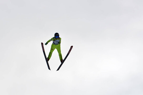Rasnov, Romania - February 7: Unknown ski jumper competes in the FIS Ski Jumping World Cup Ladies on February 7, 2015 in Rasnov, Romania