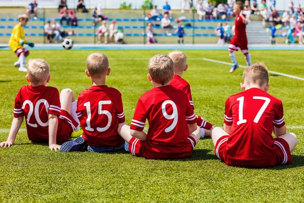 Soccer; sport; summer; player; play; child; game; training; playground; uniform; outdoor; forward; club; fun; activity; green; pitch; bench; ball; field; sunny; match; grass; active; spirit; playing; champion; goal; trainer; final; team; support; cou — Stock Photo, Image