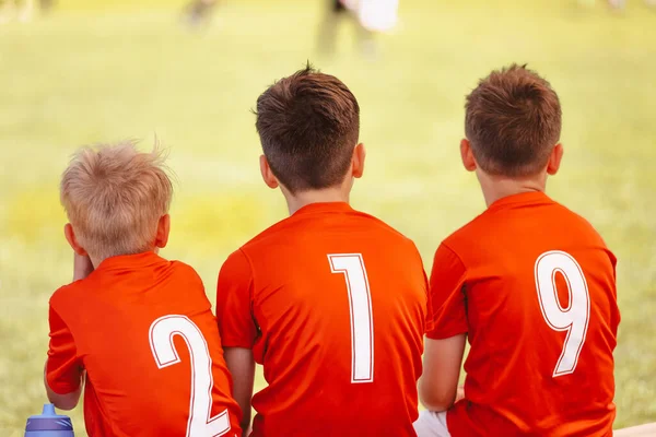 Three Young School Boys Sports Team Sitting Substitute Bench Kids — Stock Photo, Image