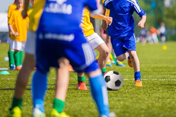 Teenagers Boys Playing Soccer Football Match. Young Football Players Running and Kicking Soccer Ball on a Soccer Pitch. — Stock Photo, Image