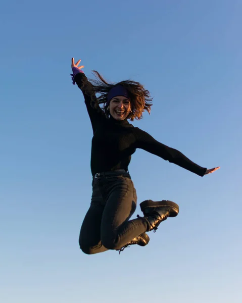 Young Adult Woman Dressed Black Clothes Boots Jumping Joy Happiness Royalty Free Stock Photos