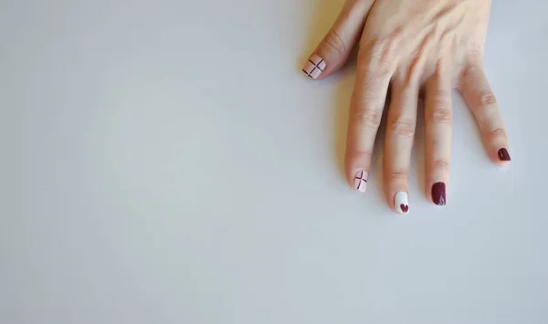Women's hands with painted nails