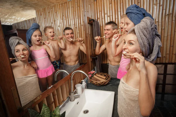 Mother Father Daughter Son Brush Teeth Together Reflected Bathroom Mirror — Stock Photo, Image