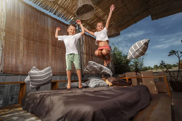 Happy Family Home Sister Brother Jumping Bed Playing Laughing Veranda — Stock Photo, Image