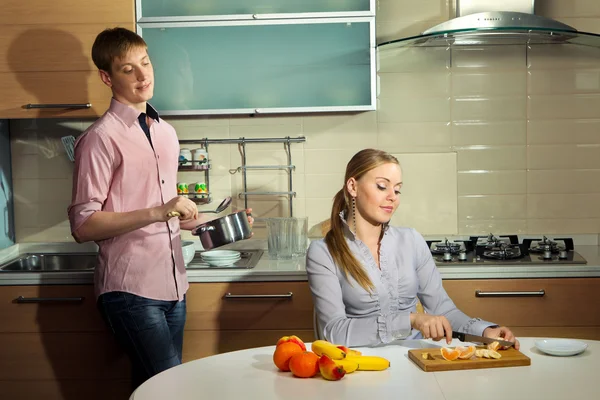 Lovely couple in kitchen — Stock Photo, Image