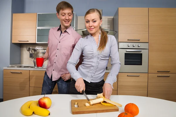 Lovely couple in kitchen — Stock Photo, Image