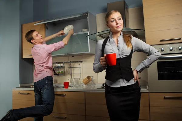 Lovely couple in kitchen — Stock Photo, Image