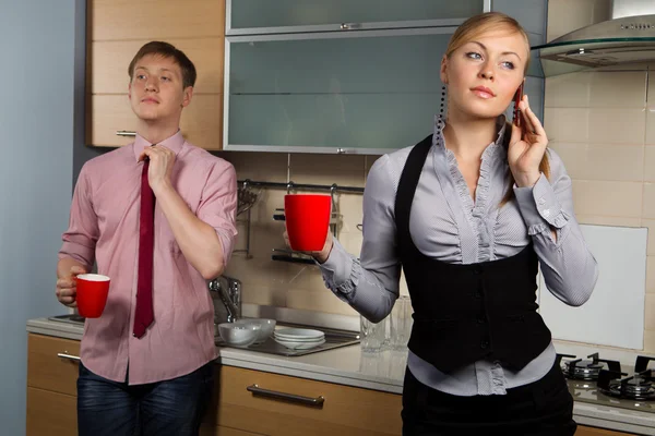 Lovely couple in kitchen — Stock Photo, Image