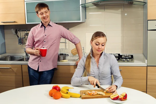 Lovely couple in kitchen