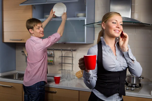 Lovely couple in kitchen — Stock Photo, Image