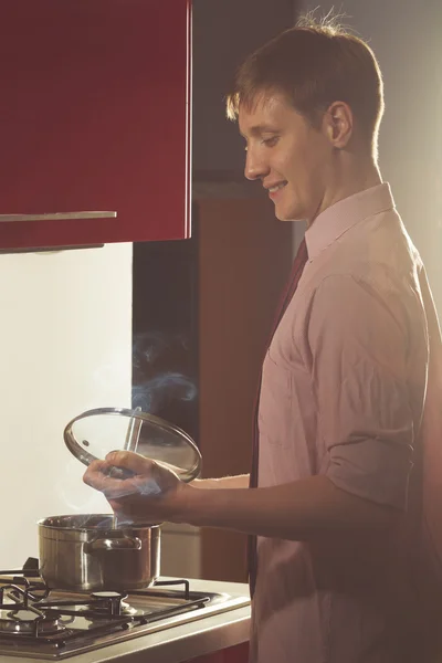 Hungry man in kitchen — Stock Image Hungry man in kitchen Royalty Free Stock Photos