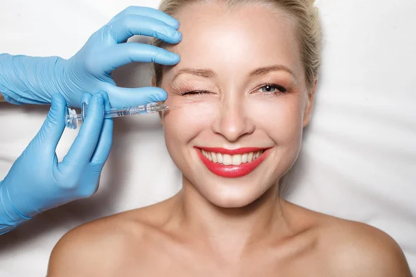 Attractive woman at plastic surgery — Stock Photo, Image