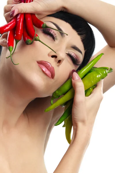 Lady holding hot chilli peppers — Stock Photo, Image