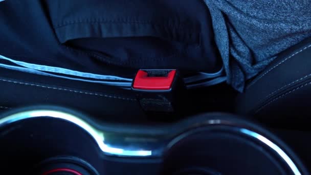 Man hand fastening fake car safety seat belt. 4K video footage. — Stock Video