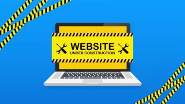 Dizüstü bilgisayarında inşaat tabelası olan bir site. Hareket grafikleri