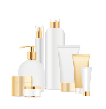 Group of white and gold cosmetic tubes.