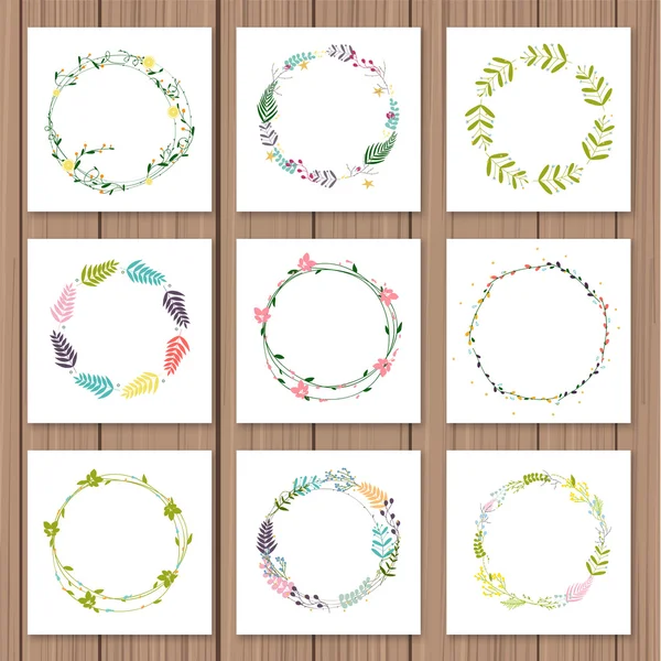 Set with floral wreaths — Stock Vector