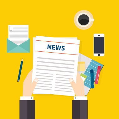 bir gazete tutan el.