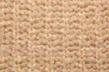 Arka plan olarak yumuşak pembe yün doku
