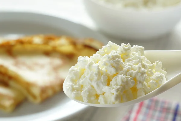 Spoon cottage cheese — Stock Photo, Image