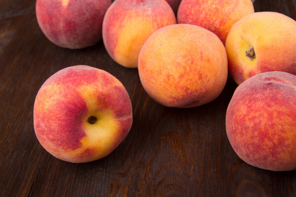 Group of peaches on a dark background