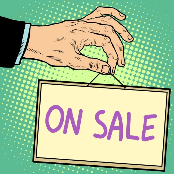 Χέρι κρατώντας μια πινακίδα στην πώληση — Διανυσματικό Αρχείο