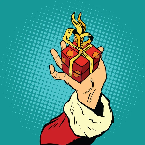 Mano de Santa Claus con regalo — Vector de stock