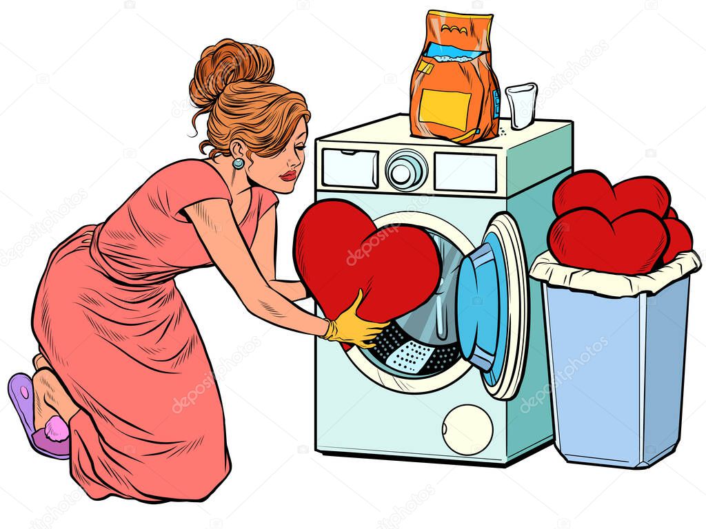 Beautiful woman washes a red heart. Valentines day