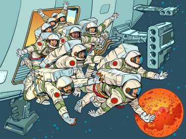 Bir grup astronot bir uzay gemisinden Mars 'a doğru koşuyor.