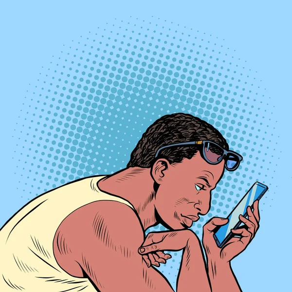 Un hombre negro surfea en el teléfono inteligente por la mañana. Rutina diaria del empresario — Vector de stock