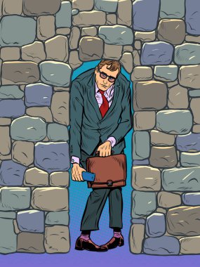 Taşlarla ezilmiş bir iş adamı. İş yerinde depresyon ve baskı